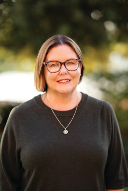 <font color="#550e0f"><b>Tracy Baker</b></font>